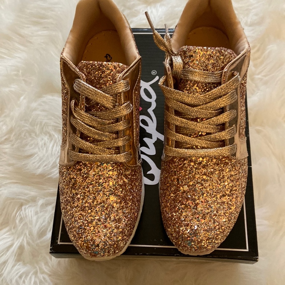 New, never worn rose gold sneakers